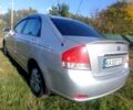 Сірий Кіа Черато, об'ємом двигуна 1.6 л та пробігом 261 тис. км за 4250 $, фото 3 на Automoto.ua