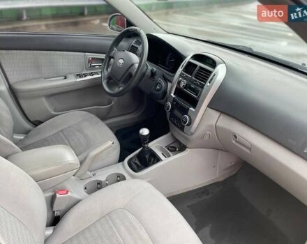 Серый Киа Черато, объемом двигателя 2 л и пробегом 183 тыс. км за 4000 $, фото 23 на Automoto.ua