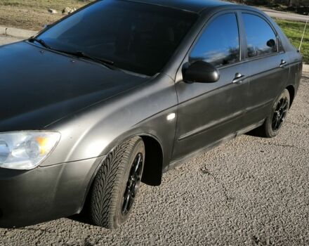 Сірий Кіа Черато, об'ємом двигуна 2 л та пробігом 310 тис. км за 4700 $, фото 1 на Automoto.ua