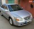 Серый Киа Черато, объемом двигателя 1.59 л и пробегом 274 тыс. км за 3350 $, фото 1 на Automoto.ua