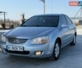 Серый Киа Черато, объемом двигателя 1.98 л и пробегом 224 тыс. км за 4500 $, фото 1 на Automoto.ua