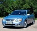 Серый Киа Черато, объемом двигателя 2 л и пробегом 417 тыс. км за 3700 $, фото 1 на Automoto.ua