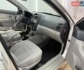Серый Киа Черато, объемом двигателя 1.59 л и пробегом 50 тыс. км за 6000 $, фото 4 на Automoto.ua