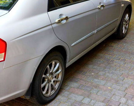 Серый Киа Черато, объемом двигателя 2 л и пробегом 186 тыс. км за 5800 $, фото 4 на Automoto.ua