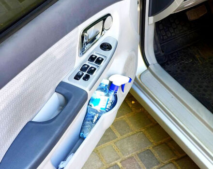 Серый Киа Черато, объемом двигателя 2 л и пробегом 186 тыс. км за 5800 $, фото 7 на Automoto.ua