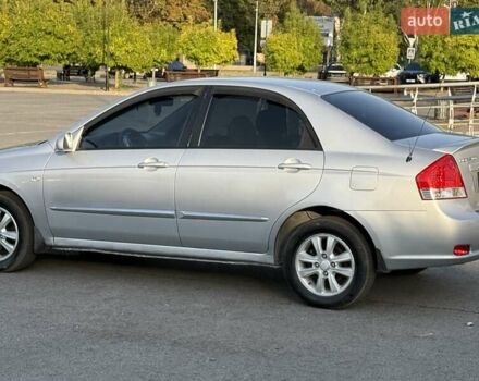 Серый Киа Черато, объемом двигателя 2 л и пробегом 202 тыс. км за 4950 $, фото 7 на Automoto.ua