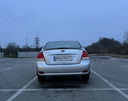 Серый Киа Черато, объемом двигателя 2 л и пробегом 326 тыс. км за 4200 $, фото 2 на Automoto.ua