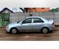 Серый Киа Черато, объемом двигателя 2 л и пробегом 350 тыс. км за 3807 $, фото 1 на Automoto.ua