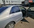 Серый Киа Черато, объемом двигателя 2 л и пробегом 268 тыс. км за 3500 $, фото 1 на Automoto.ua