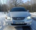 Сірий Кіа Черато, об'ємом двигуна 2 л та пробігом 240 тис. км за 5600 $, фото 1 на Automoto.ua