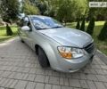 Серый Киа Черато, объемом двигателя 2 л и пробегом 257 тыс. км за 3800 $, фото 1 на Automoto.ua