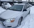 Серый Киа Черато, объемом двигателя 1.6 л и пробегом 300 тыс. км за 2850 $, фото 1 на Automoto.ua