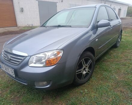 Серый Киа Черато, объемом двигателя 2 л и пробегом 237 тыс. км за 3000 $, фото 2 на Automoto.ua