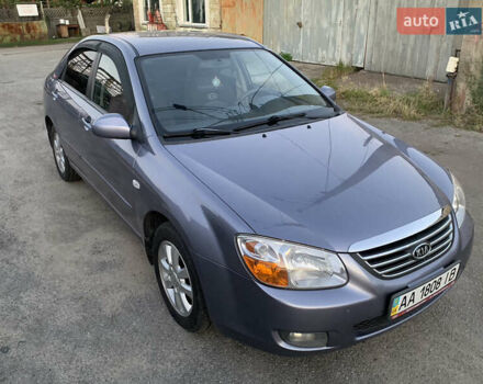 Серый Киа Черато, объемом двигателя 2 л и пробегом 175 тыс. км за 4800 $, фото 2 на Automoto.ua