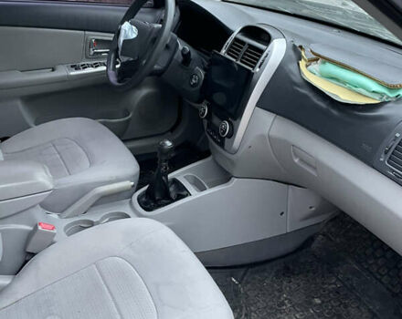 Серый Киа Черато, объемом двигателя 1.6 л и пробегом 210 тыс. км за 1900 $, фото 10 на Automoto.ua