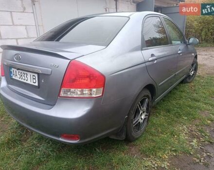Серый Киа Черато, объемом двигателя 1.98 л и пробегом 230 тыс. км за 3000 $, фото 4 на Automoto.ua