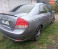Серый Киа Черато, объемом двигателя 1.98 л и пробегом 230 тыс. км за 3000 $, фото 4 на Automoto.ua