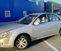 Серый Киа Черато, объемом двигателя 2 л и пробегом 217 тыс. км за 3200 $, фото 2 на Automoto.ua