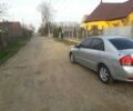Серый Киа Черато, объемом двигателя 1.6 л и пробегом 200 тыс. км за 4000 $, фото 1 на Automoto.ua