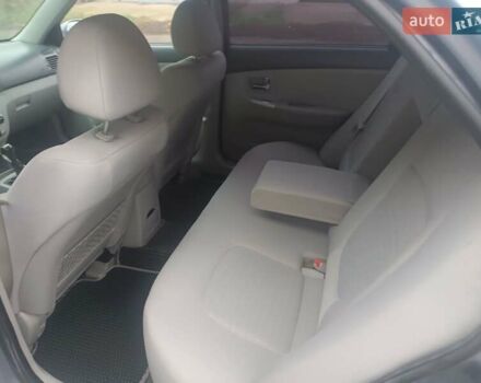 Серый Киа Черато, объемом двигателя 1.98 л и пробегом 230 тыс. км за 3000 $, фото 10 на Automoto.ua