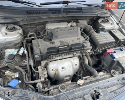 Серый Киа Черато, объемом двигателя 2 л и пробегом 160 тыс. км за 4500 $, фото 10 на Automoto.ua