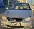 Серый Киа Черато, объемом двигателя 2 л и пробегом 217 тыс. км за 3200 $, фото 1 на Automoto.ua