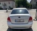 Серый Киа Черато, объемом двигателя 1.6 л и пробегом 210 тыс. км за 3800 $, фото 2 на Automoto.ua