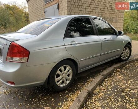 Сірий Кіа Черато, об'ємом двигуна 2 л та пробігом 199 тис. км за 5099 $, фото 2 на Automoto.ua