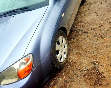 Серый Киа Черато, объемом двигателя 1.6 л и пробегом 200 тыс. км за 3900 $, фото 1 на Automoto.ua