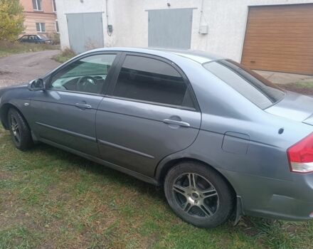 Серый Киа Черато, объемом двигателя 2 л и пробегом 237 тыс. км за 3000 $, фото 4 на Automoto.ua