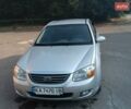 Серый Киа Черато, объемом двигателя 2 л и пробегом 191 тыс. км за 6000 $, фото 1 на Automoto.ua