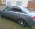 Серый Киа Черато, объемом двигателя 2 л и пробегом 237 тыс. км за 3000 $, фото 4 на Automoto.ua