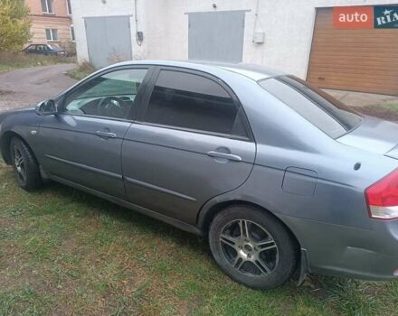 Серый Киа Черато, объемом двигателя 1.98 л и пробегом 230 тыс. км за 3000 $, фото 8 на Automoto.ua