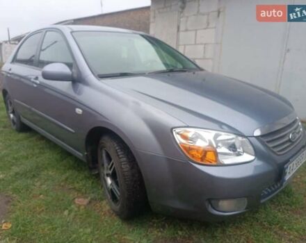 Серый Киа Черато, объемом двигателя 1.98 л и пробегом 230 тыс. км за 3000 $, фото 2 на Automoto.ua