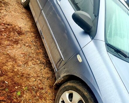 Серый Киа Черато, объемом двигателя 1.6 л и пробегом 200 тыс. км за 3900 $, фото 2 на Automoto.ua