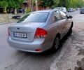Серый Киа Черато, объемом двигателя 1.6 л и пробегом 181 тыс. км за 3750 $, фото 3 на Automoto.ua