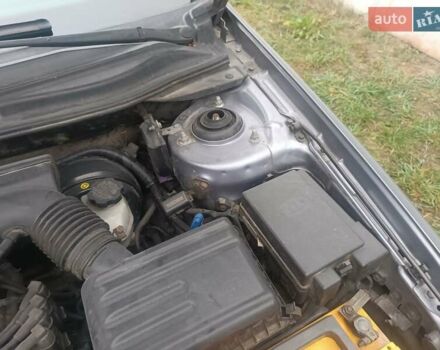 Серый Киа Черато, объемом двигателя 1.98 л и пробегом 230 тыс. км за 3000 $, фото 6 на Automoto.ua