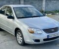 Серый Киа Черато, объемом двигателя 1.6 л и пробегом 215 тыс. км за 4500 $, фото 1 на Automoto.ua