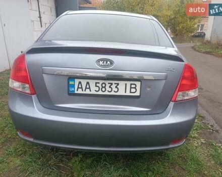 Серый Киа Черато, объемом двигателя 1.98 л и пробегом 230 тыс. км за 3000 $, фото 5 на Automoto.ua