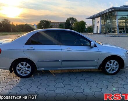 Серый Киа Черато, объемом двигателя 2 л и пробегом 225 тыс. км за 4800 $, фото 1 на Automoto.ua