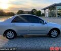 Серый Киа Черато, объемом двигателя 2 л и пробегом 225 тыс. км за 4800 $, фото 1 на Automoto.ua