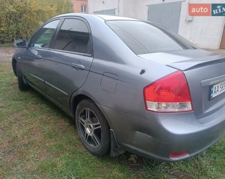 Серый Киа Черато, объемом двигателя 1.98 л и пробегом 230 тыс. км за 3000 $, фото 3 на Automoto.ua