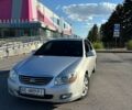 Серый Киа Черато, объемом двигателя 1.98 л и пробегом 210 тыс. км за 5000 $, фото 1 на Automoto.ua
