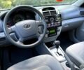 Серый Киа Черато, объемом двигателя 2 л и пробегом 215 тыс. км за 4950 $, фото 7 на Automoto.ua