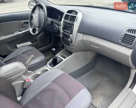 Серый Киа Черато, объемом двигателя 2 л и пробегом 160 тыс. км за 4500 $, фото 5 на Automoto.ua