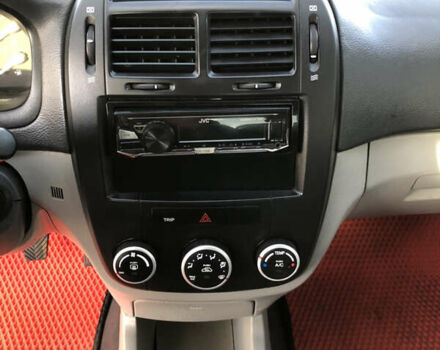 Серый Киа Черато, объемом двигателя 1.6 л и пробегом 213 тыс. км за 4400 $, фото 30 на Automoto.ua