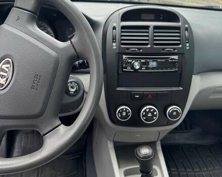 Серый Киа Черато, объемом двигателя 1.6 л и пробегом 116 тыс. км за 4000 $, фото 1 на Automoto.ua