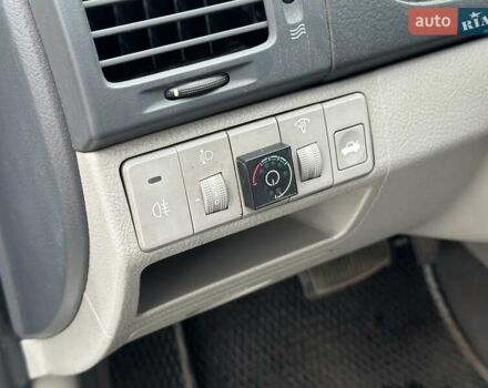 Серый Киа Черато, объемом двигателя 1.98 л и пробегом 188 тыс. км за 4990 $, фото 15 на Automoto.ua