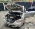 Сірий Кіа Черато, об'ємом двигуна 2 л та пробігом 192 тис. км за 4700 $, фото 1 на Automoto.ua