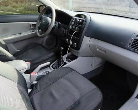 Серый Киа Черато, объемом двигателя 1.6 л и пробегом 176 тыс. км за 5500 $, фото 9 на Automoto.ua